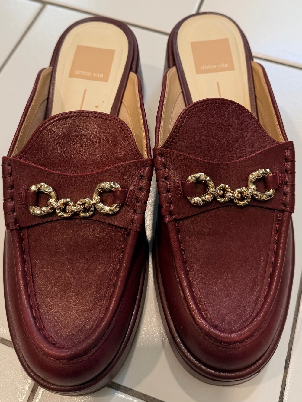 Dolce Vita Wine Leather Slip-On Mules with Gold Chain Detail